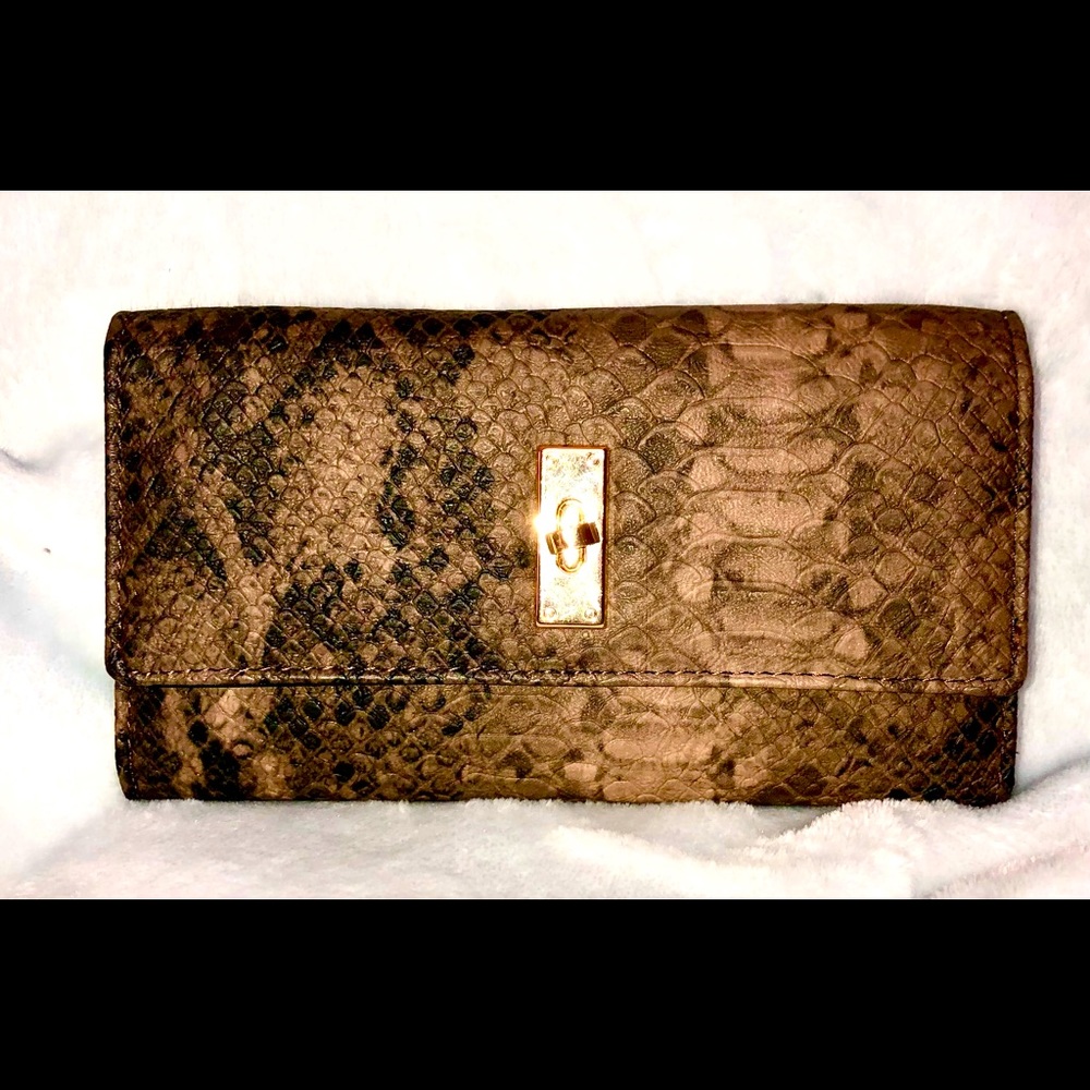 Wallet checkbook. Leather, snake.